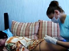 Asian ass receives an injection tube porn video