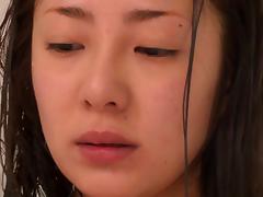 Minori Hatsune fingers her hairy Japanese pussy in the shower tube porn video