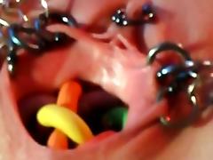Extremely bizarre pierced vaginal insertions tube porn video