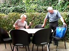 Senior citizens on a picnic are joined by a cutie for a threesome tube porn video