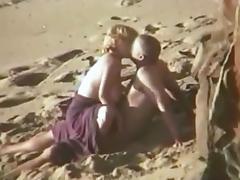 Candid beach camera filmed a horny vixen tube porn video