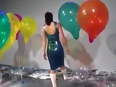 Sexy Girl In Latex Dress Blows to Pop Some Big Balloons tube porn video