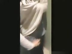 Asian girl has sex with her bf in a public toilet tube porn video