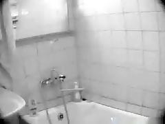 Voyeur tapes a big boobed girl taking a shower tube porn video