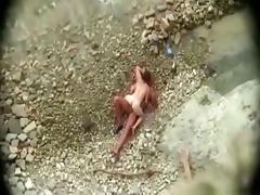 Voyeur tapes a mature couple having sex at the beach tube porn video