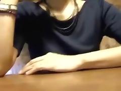 Crazy asian girl, wearing no panties, gives her man a blowjob, while dining in a restaurant. tube porn video