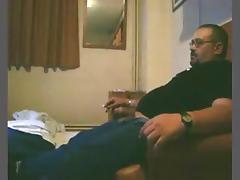 Dude smokes a cig, while his bbw wife sucks and rides him on the sofa. tube porn video