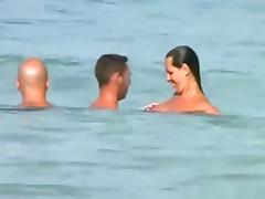 Voyeur tapes a girl sucking her bf's cock on a nude beach tube porn video