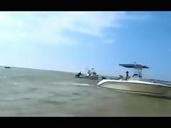 Crazy girl sucks cock on a boat, while other people can see it and spreads her ass in the salty sea. tube porn video