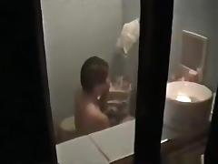 Voyeur captures the neighbor asian girl showering and masturbating tube porn video