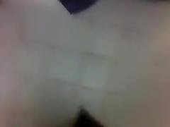 Engulfing hard cut strapon in a public WC. tube porn video