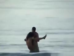 Voyeur tapes a crazy couple having sex in the sea tube porn video