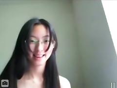 Nerdy glassed asian girl masturbates her shaved pink pussy with a vibrator tube porn video