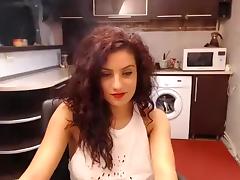 Curllynelly settled in the kitchen in front of webcam tube porn video