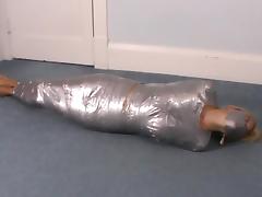 Blonde girl wrapped in duct tape struggles tube porn video