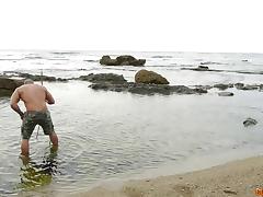 Very muscular couple has hardcore sex on rocks at the beach tube porn video