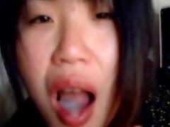 Asian babe jerking and sucking tube porn video