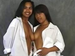 Two sexy lesbians from Asia having fun with the horny guy tube porn video