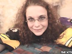 Wearing a football jersey and thigh high stockings, she fucks her dildo tube porn video