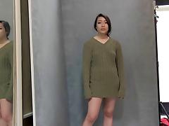 Asian girl in a loose sweater looks sexy posing for pics tube porn video