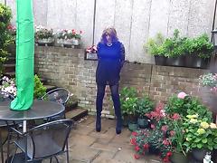 Wanking and plugged in the garden in thigh high boots tube porn video