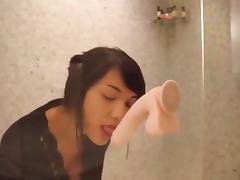 Girl plays with her dildo in the shower tube porn video