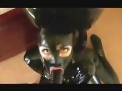 Blowjob in latex tube porn video