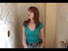Pale freckled redhead sucks through a gloryhole tube porn video