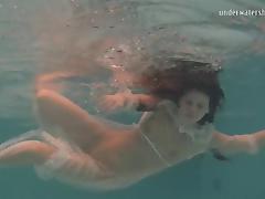 Sexy babe gets out of her white dress while being under the water tube porn video