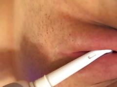 Masturbating with a toothbrush tube porn video