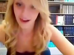 Blonde undresses in the library tube porn video