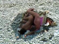 Voyeur captures couple secretly fucking at a nudist beach tube porn video