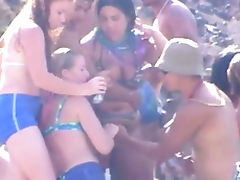 Bikini wearing temptresses going crazy on the beach tube porn video