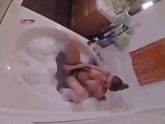 HIDDEN CAMERA catches stacked MILF masturbating in tub tube porn video