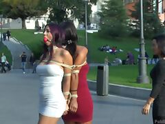 Coral Joice and Julia De Lucia tied up in public with ball gags tube porn video