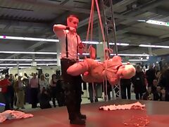Bondage show in a shopping centre tube porn video