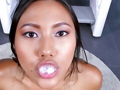 Amateur asian May Thai on her knees sucking a dick of a stranger tube porn video