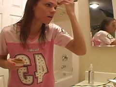 Young teen is doing make up in her bathroom using quite lots of details tube porn video