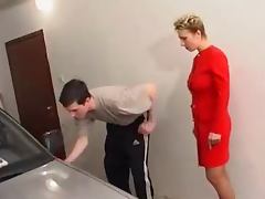 Mature On a Red Outfit Fucking A Young Cock In The Garage tube porn video