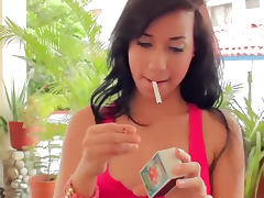 Cutie in braces smokes cigarette outdoors tube porn video