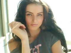 Veronica Lavery the sizzling brunette poses on a balcony tube porn video