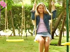 Blonde Girl Peeing While She's On The Swings tube porn video