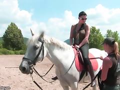 Brunette hottie Aletta Ocean rides a horse on a race course tube porn video