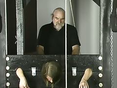 Old guy pounds young brunette with small tits jailed in stocks tube porn video