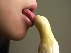 Gorgeous Japanese hotty sexily eating a banana tube porn video