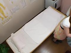 Adorable Japanese babe gets fingered in voyeur massage clip tube porn video