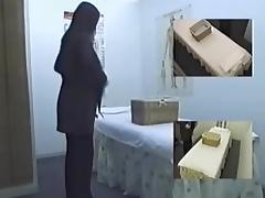 Skinny Asian broad enjoys a massage on hidden camera tube porn video