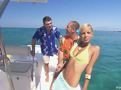 Naughty blond angel is getting two hard cocks on the yacht tube porn video