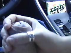 Blonde is wanking a dick in the car tube porn video