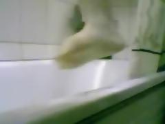 Masturbating rough with the shower tube porn video